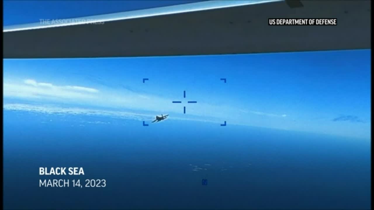 Pentagon video shows Russian jet dumping fuel on US drone YouTube