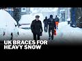 Britain BRACES for further heavy snowfall as temperatures plunge below freezing