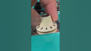 Zit de knop van je gitaar scheef?