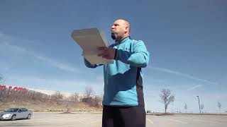 Man eats pizza found in parking lot