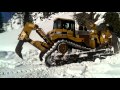 Гусеничный бульдозер CAT D9R в работе