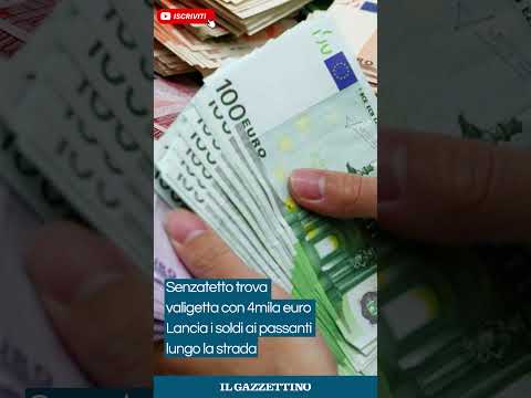 Video Senzatetto trova valigetta con 4mila euro e lancia i soldi ai passanti lungo la strada