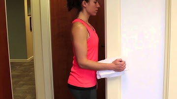 Standing Isometric Shoulder Internal  Rotation With Towel Roll at Doorway