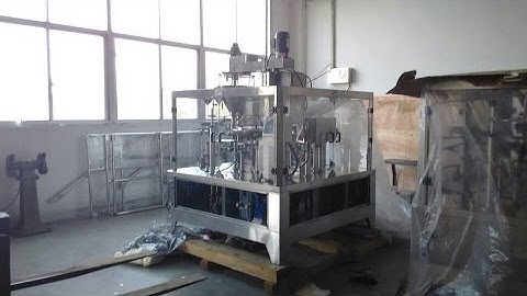 Doypack machine for liquid piston filling and sealing system zippered preformed pouch filler
