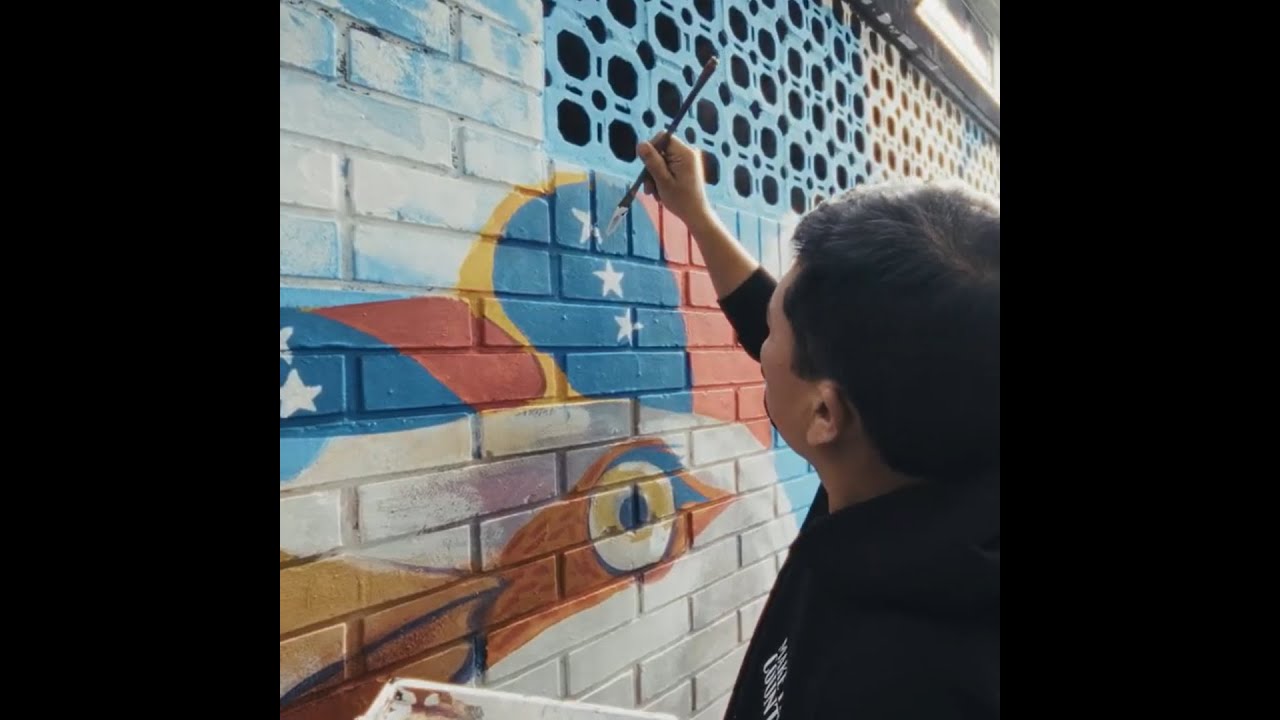 Climate Refugees in the Global South: a community mural project