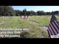 Port Charlotte JROTC cadets put flags on vet graves