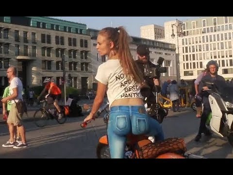 girl-in-body-painted-jeans-walks-across-streets