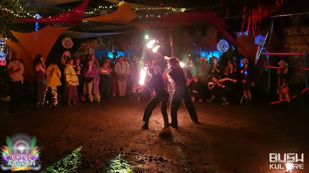 Tribe Ascension V Fyrelaw and Wildfyre duo double staff routine. 