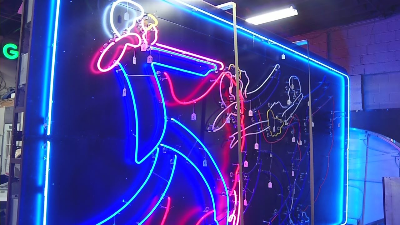Tango Signs Classic neon tango dancers sign restored and ready to make return - YouTube