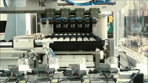 Tray handling system integrated with Pick and Place Robot - RNA Automation Ltd