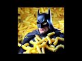 Batman eating macaroni and cheese