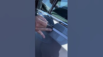 Hand painted pinstripe on a Cadillac