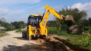 JCB Backhoe 3DX Machine Working Road Construction, Loading On Soil Tractor