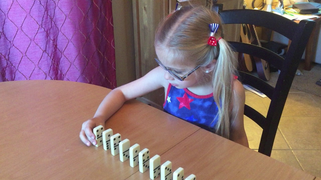 How to knock over dominoes YouTube