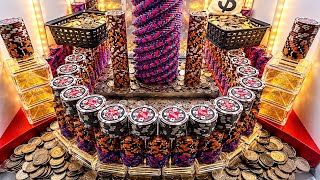 Two baskets of quarters on the edge high limit coin pusher