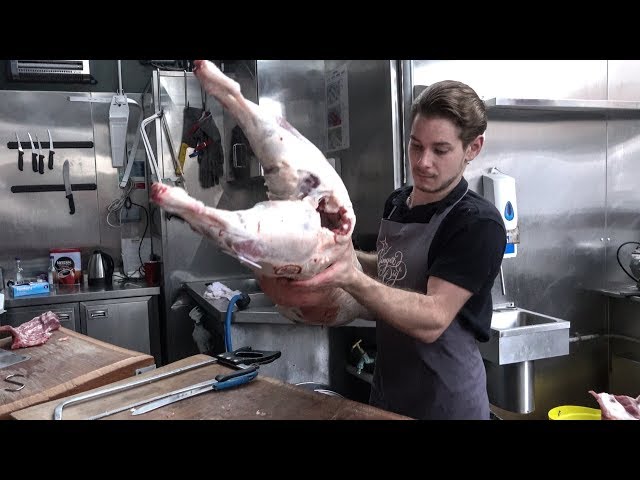London Butchers Preparing Lambs, Pigs and Cows on the Street Markets. Street Food