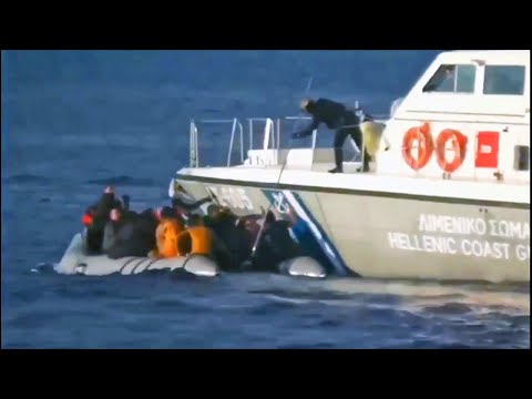 Greek coast guard 'fires shots' at refugee boat in video released by Turkish government