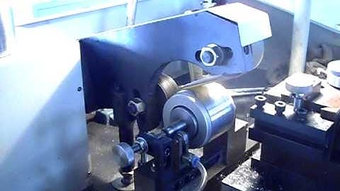 Rotor commutator surface turning machine