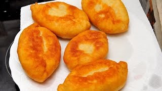 Домашние пирожки, жареные на сковороде Домашние пирожки, жареные на сковороде