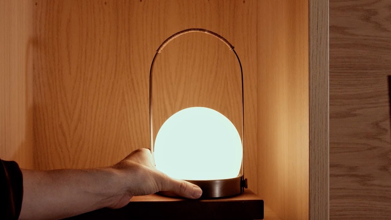 Audo Copenhagen Carrie Portable LED Table Lamp in bronzed brass 