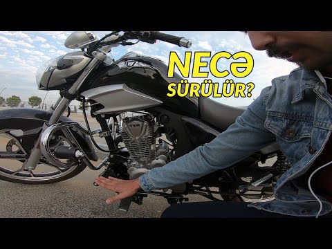 Video: Bir motosiklet kaskasını necə bağlayırsınız?