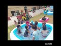 little kids swimming in school