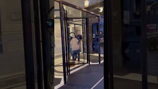 Guy Tries To Carry Citibike Inside Hotel's Revolving Door