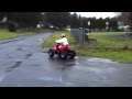 Kids riding their quad