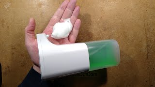 Inside an automatic foam soap dispenser with clever pump.