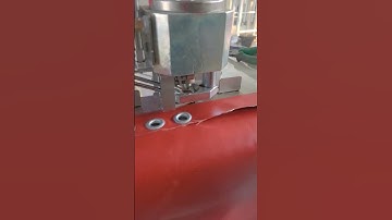 automatic eyelet punching machine