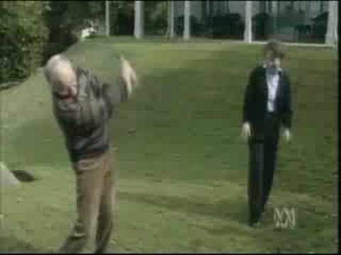 John Howard almost takes out Janette with a golf c...