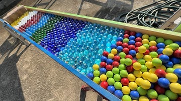 Make a water marble run course using a transparent hose, a rotating bucket, and an aquarium. #ASMR