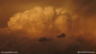 Long-track supercell dropping large hail funnel clouds in eastern North Dakota on