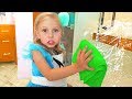 Little girl pretend play with cleaning toys