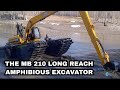Watch this amphibious excavator by cleantec infra at work the mb 210 long reach marsh buggy