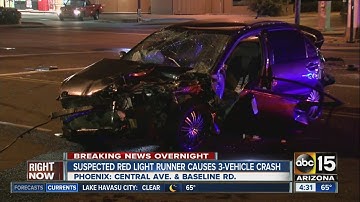 Suspected red light runner causes crash