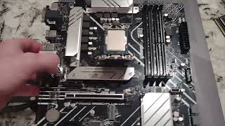 installation CPU in ASUS Prime B660-PLUS D4 motherboard, RAM, SSD, simulated Case & Power connection