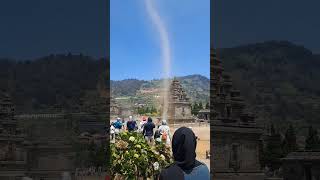 Person Filming a Dust Devil's Formation Up-Close