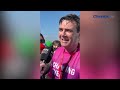 Prime Minister Andy Burnham gives an interview after finishing the Great North Run
