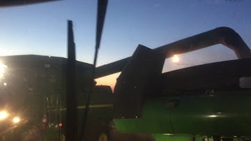 Combining Wheat, Unloading on the Go.