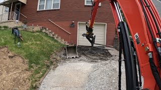 KX057-5 with Engcon EC206 tearing out concrete driveway and loading RAM 5500 dump truck (part 1)