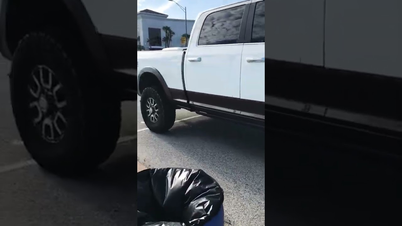 RAM 2500 Longhorn lifted on 37X12.5 With Stock 18” Wheels