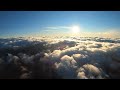 Осенний закат над облаками с дрона 4K