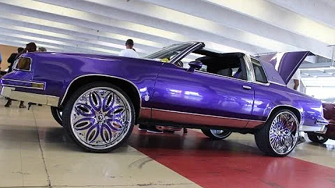 Purple T-top Cutlass on 24" Forgiato Wheels