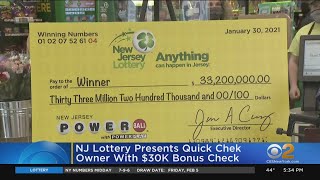 NJ Lottery Presents Quick Chek Owner With $30K Bonus Check screenshot 1