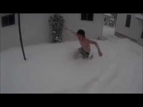 kid jumping around in the snow (without shirt or warmth) - YouTube