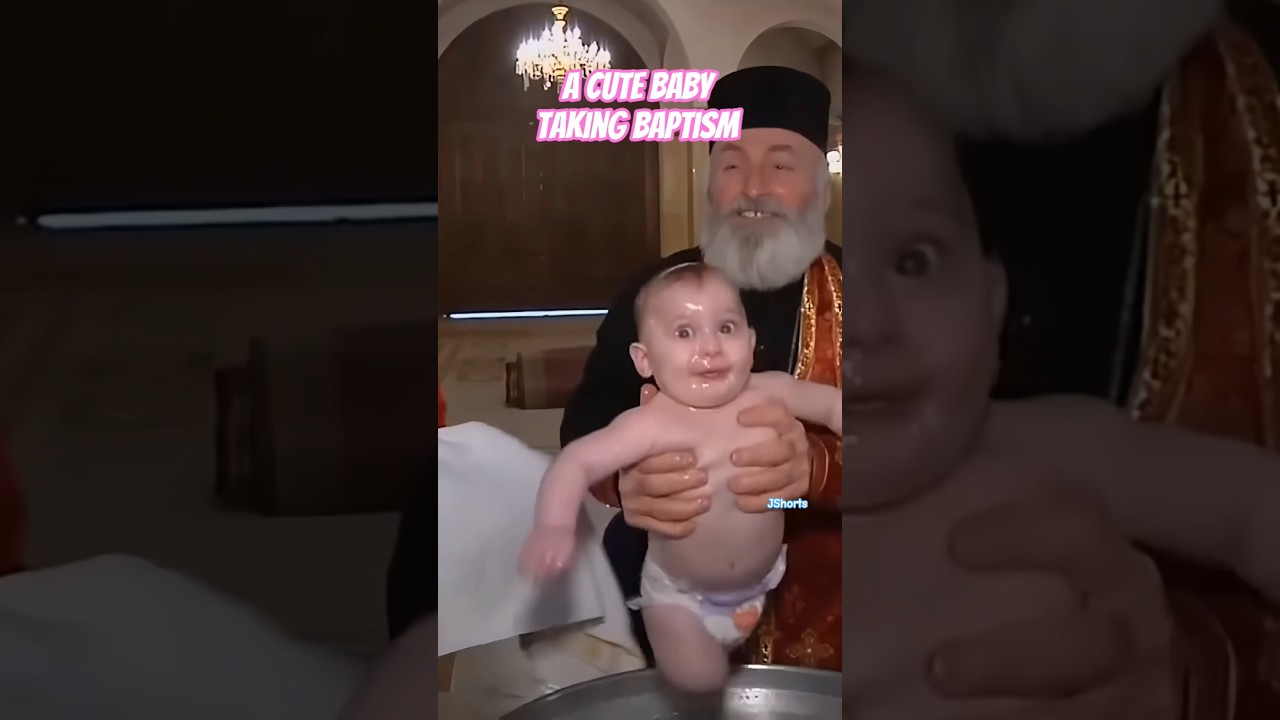 A cute baby taking baptism 😊😊😊 respect to Jesus ✝️💖 🙏🙏🙏 