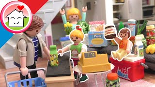 Playmobil en francais Son propre supermarché dans le salon - Famille Hauser