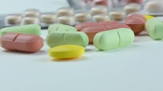 Prescription Pills On White Surface Stock Footage