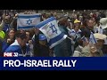 Crowds rally in downtown chicago to celebrate the founding of israel amid palestinian protest